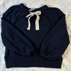 Anthropologie Navy Sweater with Cream Bow 
size M